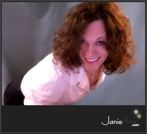 redhead transgender model janie black secretary white shirt and skirt smiling portrait