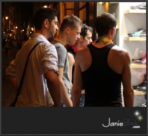 Four Guys Looking at Shoes in a Shop Window